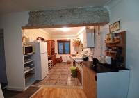 Kuchyň nebo kuchyňský kout v ubytování Habitaciones en El Atico de Tona mirando a la Bahia de Santander