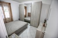 A bed or beds in a room at Villa Benedetta