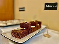 a piece of chocolate cake on a plate on a table at Hotel Tugasa Castillo de Castellar in Castellar de la Frontera