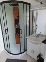a bathroom with a shower and a sink at O&#39;Couvent - Appartement 62 m2 - 2 chambres - A513 in Salins-les-Bains