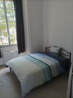 Łóżko lub łóżka w pokoju w obiekcie O'Couvent - Appartement 87m2 - 4 chambres - A511