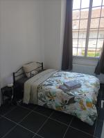 Łóżko lub łóżka w pokoju w obiekcie O'Couvent - Appartement 87m2 - 4 chambres - A511
