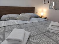 Posteľ alebo postele v izbe v ubytovaní Luxury Apartman NR