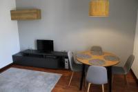 Televízia a/alebo spoločenská miestnosť v ubytovaní Apartment Mirta