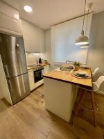 Kuchyň nebo kuchyňský kout v ubytování Apartamento céntrico Pontevedra