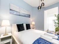 Postel nebo postele na pokoji v ubytování Beach Cascais Apartment
