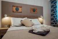 Posteľ alebo postele v izbe v ubytovaní Guesthouse Villa Diana