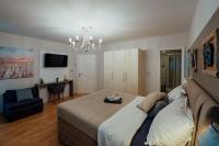 Posteľ alebo postele v izbe v ubytovaní Guesthouse Villa Diana