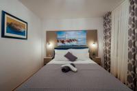 Posteľ alebo postele v izbe v ubytovaní Guesthouse Villa Diana