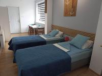 Postel nebo postele na pokoji v ubytování BIG BLUE Apartments - 2 osobowy