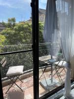 A balcony or terrace at Luxury Central Apartment