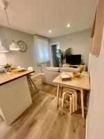 TV a/nebo společenská místnost v ubytování Apartamento céntrico Pontevedra