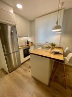 Kuchyň nebo kuchyňský kout v ubytování Apartamento céntrico Pontevedra