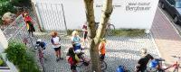 a group of people standing next to a tree at Hotel Bergbauer in Neuburg an der Donau