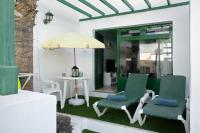 A seating area at Apt 2 Las Palmeras iii Lanzarote