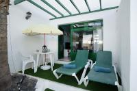 A seating area at Apt 2 Las Palmeras iii Lanzarote