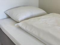 Postel nebo postele na pokoji v ubytování BORG Sommerhotell