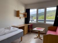 Postel nebo postele na pokoji v ubytování BORG Sommerhotell