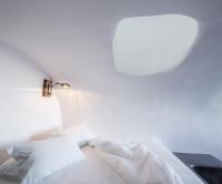 Łóżko lub łóżka w pokoju w obiekcie White Pearl Villas