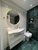 Kúpeľňa v ubytovaní Crown Syntagma Apartment
