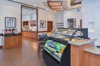 a grocery store with a display case in a store at Hyatt Place Herndon Dulles Airport - East in Herndon