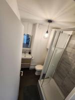 a bathroom with a shower and a toilet and a sink at L&#39;Escale Lafayette - Appartement Rive Gauche in Rouen