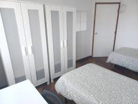 Postel nebo postele na pokoji v ubytování Oporto Sea Rooms
