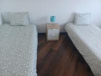 Postel nebo postele na pokoji v ubytování Oporto Sea Rooms