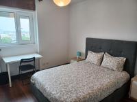 Postel nebo postele na pokoji v ubytování Oporto Sea Rooms