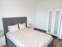 Postel nebo postele na pokoji v ubytování Oporto Sea Rooms