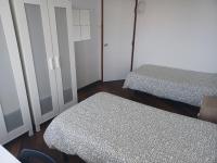 Postel nebo postele na pokoji v ubytování Oporto Sea Rooms