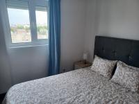 Postel nebo postele na pokoji v ubytování Oporto Sea Rooms