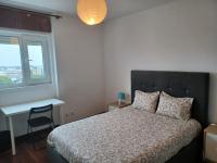 Postel nebo postele na pokoji v ubytování Oporto Sea Rooms