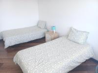 Postel nebo postele na pokoji v ubytování Oporto Sea Rooms