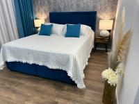Posteľ alebo postele v izbe v ubytovaní Apartments Satis