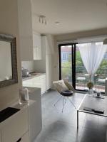 A kitchen or kitchenette at Luxury Central Apartment
