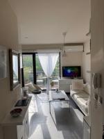 A television and/or entertainment centre at Luxury Central Apartment