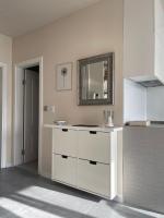 A kitchen or kitchenette at Luxury Central Apartment