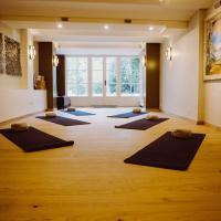 a yoga room with a bunch of yoga mats at Villa Amara in Aix-en-Provence