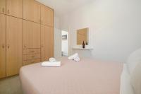 Posteľ alebo postele v izbe v ubytovaní Oniropetra Apartments Mykonos
