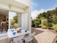 Vonkajšia záhrada v ubytovaní Appartement 3 pièces à Carnac avec piscine chauffée, proche plage et thalasso - 4 pers. - FR-1-477-230