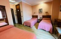 Postel nebo postele na pokoji v ubytování Hotel Los Castaños