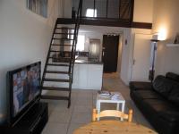 Televízia a/alebo spoločenská miestnosť v ubytovaní T3 Mezzanine 6 Pers, Parking, Animaux Ok, Proche Plage - FR-1-106-70