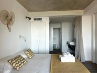 Posteľ alebo postele v izbe v ubytovaní Appartements Les Lofts de Sainte-Lucie-de-Porto-Vecchio