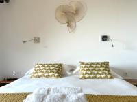 Posteľ alebo postele v izbe v ubytovaní Appartements Les Lofts de Sainte-Lucie-de-Porto-Vecchio