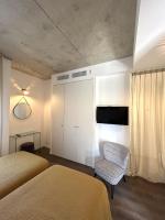 Posteľ alebo postele v izbe v ubytovaní Appartements Les Lofts de Sainte-Lucie-de-Porto-Vecchio