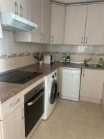Kuchyň nebo kuchyňský kout v ubytování Jardines Apartment