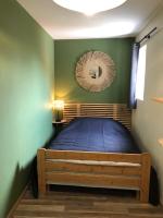 Postel nebo postele na pokoji v ubytování Villa ALOHA