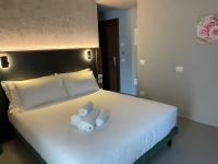 Villa Clementina Boutique Hotelにあるベッド