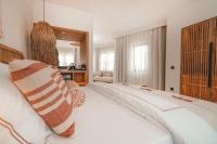 Postel nebo postele na pokoji v ubytování 6 ROOMS BY AZUMARE